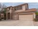 Two-story home featuring a two-car garage and a rock front yard at 1805 E Sagebrush St, Gilbert, AZ 85296