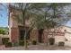 Two-story home with a rock landscape and a well maintained lawn at 1805 E Sagebrush St, Gilbert, AZ 85296