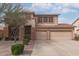 Two-story home featuring a two-car garage and well maintained landscape at 1805 E Sagebrush St, Gilbert, AZ 85296