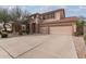 Two-story home featuring a two-car garage and a rock front yard at 1805 E Sagebrush St, Gilbert, AZ 85296