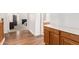 Hallway with wood floors and view of bedrooms, plus built-in cabinets along the walls at 1805 E Sagebrush St, Gilbert, AZ 85296