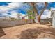 Spacious backyard enclosed with a block wall, offering privacy and security for outdoor activities and relaxation at 1900 S Coconino Dr, Apache Junction, AZ 85120