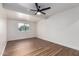 Bedroom features wood flooring, recessed lighting, natural light, and ceiling fan at 1900 S Coconino Dr, Apache Junction, AZ 85120