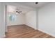 Bright living room featuring wood flooring, recessed lights, and modern ceiling fan at 1900 S Coconino Dr, Apache Junction, AZ 85120