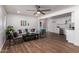 Open concept living room featuring hardwood floors, recessed lighting, and contemporary furnishings at 1900 S Coconino Dr, Apache Junction, AZ 85120