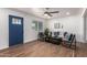 Open concept living room featuring hardwood floors, recessed lighting, and contemporary furnishings at 1900 S Coconino Dr, Apache Junction, AZ 85120