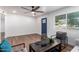 Open concept living room featuring hardwood floors, recessed lighting, and contemporary furnishings at 1900 S Coconino Dr, Apache Junction, AZ 85120