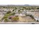 Aerial view featuring a neighborhood park with playground, picnic areas, and mature trees at 19013 E Seagull Dr, Queen Creek, AZ 85142