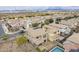 Aerial view of the property featuring a swimming pool and landscaped backyard with a patio at 19013 E Seagull Dr, Queen Creek, AZ 85142