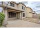 Spacious backyard featuring a covered patio and a well-maintained brick paver area at 19013 E Seagull Dr, Queen Creek, AZ 85142