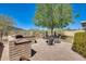 Enjoyable backyard featuring a built-in barbecue, seating area, and desert landscape, ideal for relaxing outdoors at 20630 N 42Nd Ave, Glendale, AZ 85308