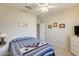 Comfortable bedroom with carpet flooring and natural light at 20630 N 42Nd Ave, Glendale, AZ 85308
