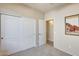 Bedroom featuring a double door closet at 20630 N 42Nd Ave, Glendale, AZ 85308