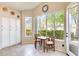 Cozy breakfast nook with bright windows, small table, and updated cabinets at 20630 N 42Nd Ave, Glendale, AZ 85308