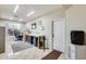 Well-lit workshop features a work bench, storage, and a large window for natural light at 20630 N 42Nd Ave, Glendale, AZ 85308
