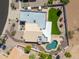 Aerial view featuring a pool, grassy backyard, and patio, showcasing the property's outdoor space at 2077 N Lake Shore Dr, Casa Grande, AZ 85122
