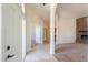 Welcoming foyer showcasing an arched entryway and a glimpse into the living space at 2077 N Lake Shore Dr, Casa Grande, AZ 85122
