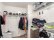 Walk-in closet with wire shelving and clothing at 23359 W Cocopah St, Buckeye, AZ 85326