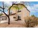 Two-story home featuring a two-car garage, neutral paint and desert landscaping at 23359 W Cocopah St, Buckeye, AZ 85326