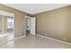 Bedroom with tile floors, white door and mirror closet at 2348 W Laurel Ln, Phoenix, AZ 85029