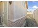 Exterior shot of home with neutral paint, partial grass and block perimeter wall at 2348 W Laurel Ln, Phoenix, AZ 85029