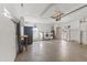 View of the garage with utility sink, washer/dryer and open garage door at 2348 W Laurel Ln, Phoenix, AZ 85029