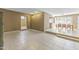 Spacious living room with tile floors and great natural lighting at 2348 W Laurel Ln, Phoenix, AZ 85029