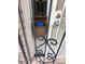 Picture of a mailbox mounted to a secured front door with a metal security screen at 2348 W Laurel Ln, Phoenix, AZ 85029