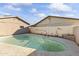 Backyard with a sparkling pool surrounded by a large patio area at 2348 W Laurel Ln, Phoenix, AZ 85029