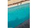 Refreshing turquoise swimming pool with ladder, perfect for hot summer days at 2348 W Laurel Ln, Phoenix, AZ 85029