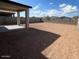 A spacious backyard with a covered patio, perfect for outdoor living and entertaining at 25156 W Wayland Dr, Buckeye, AZ 85326