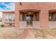 Covered back patio area with ceiling fan, accessible from within the home at 2600 E Springfield Pl # 10, Chandler, AZ 85286