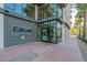 Modern building entrance with glass doors and windows, showcasing an upscale and inviting atmosphere at 3131 N Central Ave # 3001, Phoenix, AZ 85012