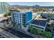 Modern apartment building boasts a rooftop pool, manicured landscaping, and prime location in a vibrant urban neighborhood at 3131 N Central Ave # 3001, Phoenix, AZ 85012