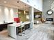 Modern kitchen with oversized island, sleek countertops, stainless steel appliances, and ample seating at 3131 N Central Ave # 3001, Phoenix, AZ 85012