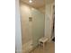 Modern walk-in shower with a glass partition, tiled walls, and built-in niche for toiletries at 3131 N Central Ave # 3001, Phoenix, AZ 85012