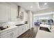 Contemporary kitchen featuring stainless steel appliances, white cabinetry, and a sleek design at 3244 E Daley Ln, Phoenix, AZ 85050