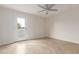 Bright bedroom with a door to the outside patio and ceiling fan at 3314 N 68Th St # 247, Scottsdale, AZ 85251