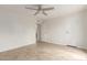 Cozy bedroom with tile floors, ceiling fan, and neutral walls at 3314 N 68Th St # 247, Scottsdale, AZ 85251
