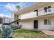 Building featuring stucco, landscaping, walkways, and stairs to the second level at 3314 N 68Th St # 247, Scottsdale, AZ 85251