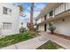 Exterior of the building features stucco, landscaping, walkways, and stairs to the second level at 3314 N 68Th St # 247, Scottsdale, AZ 85251