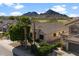 Charming single-story home featuring desert landscaping and mountain views in a beautiful Arizona community at 33290 N Roadrunner Ln, San Tan Valley, AZ 85144