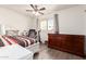 Comfortable bedroom with hardwood floors and a large window at 3345 E University Dr # 29, Mesa, AZ 85213