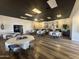 Light and bright dining room with wood floors, tables, and decorative wall hangings at 3345 E University Dr # 29, Mesa, AZ 85213