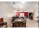 Open dining area flowing into a cozy living room with natural light at 3345 E University Dr # 29, Mesa, AZ 85213