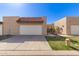 Charming single-story home featuring a one-car garage and gated entrance at 3345 E University Dr # 29, Mesa, AZ 85213
