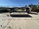 Outdoor fire pit with tile accents and planter detail, perfect for enjoying cool evenings at 3345 E University Dr # 29, Mesa, AZ 85213