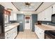 Well-lit kitchen showcasing ample counter space and white cabinetry at 3345 E University Dr # 29, Mesa, AZ 85213