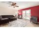 Comfortable living room with stylish decor, a ceiling fan, and French doors at 3345 E University Dr # 29, Mesa, AZ 85213