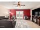 Cozy living room featuring a comfortable sofa, stylish chairs, and French doors at 3345 E University Dr # 29, Mesa, AZ 85213